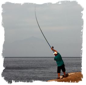 Fishing with Mt Teide (Tenerife) in the distance